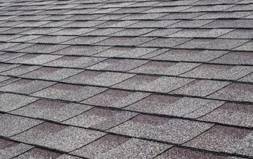Cowfold tiles for shallow pitch roofing